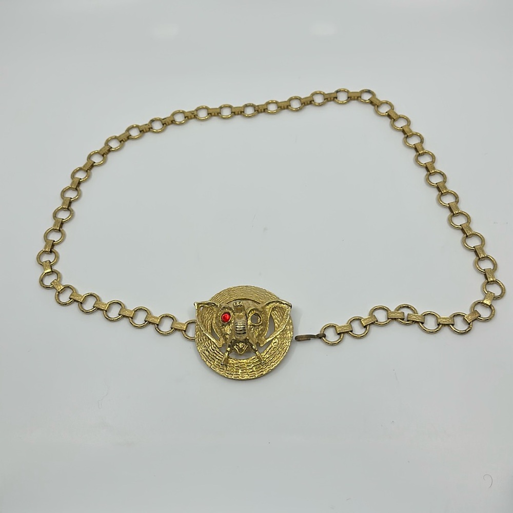 Vintage unique elephant head goldtone metal link belt.